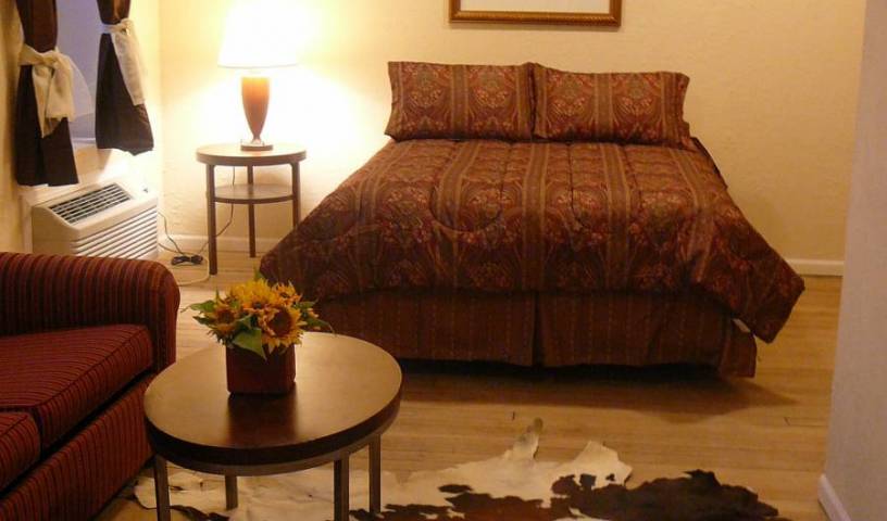 Holly Inn Suites - Zoek beschikbare kamers en bedden voor hostel en hotelreserveringen in Holly, backpacker hostel 7 foto's